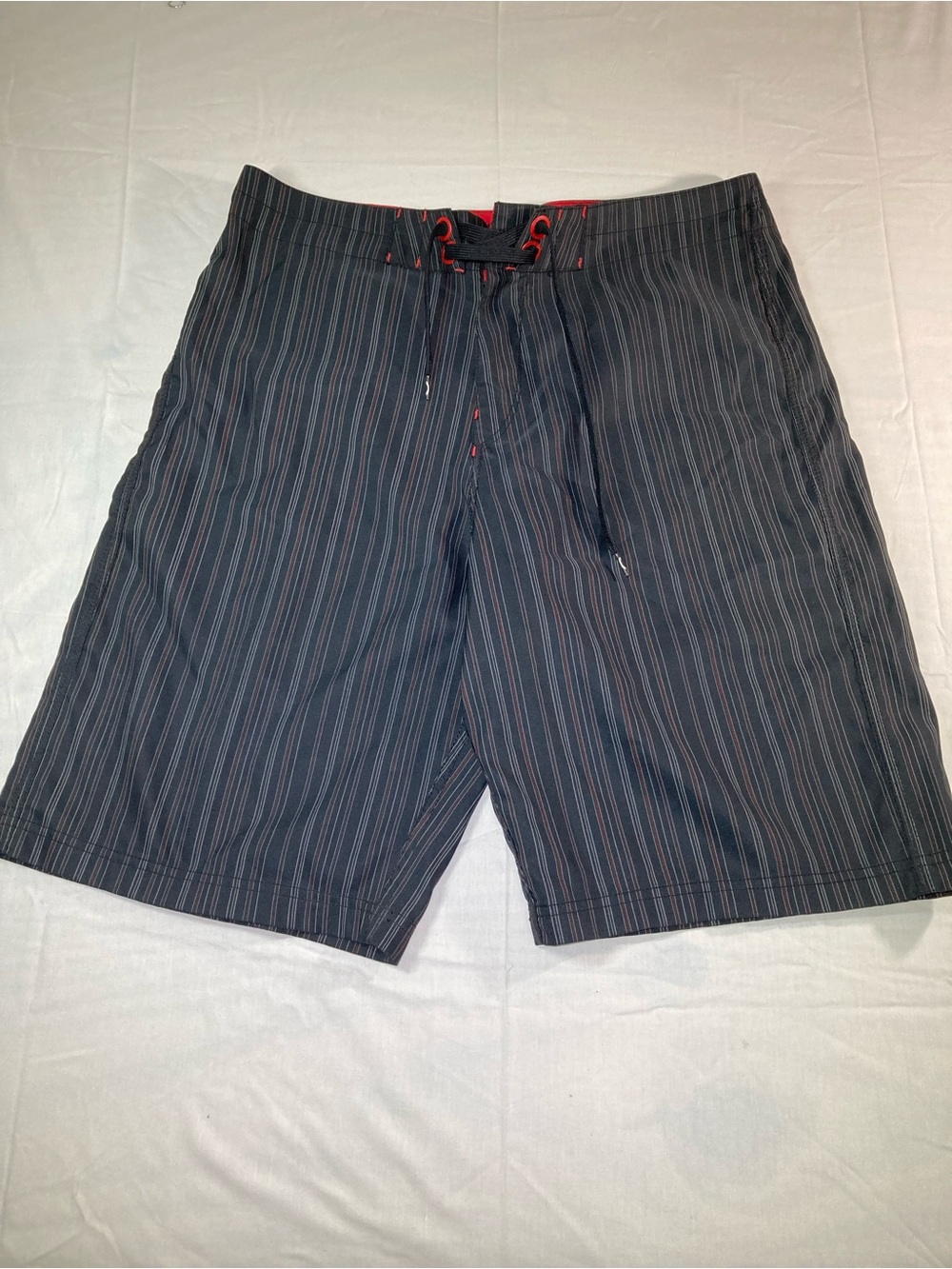 Oakley Black Pinstripe Swim Board Shorts with Red Accents